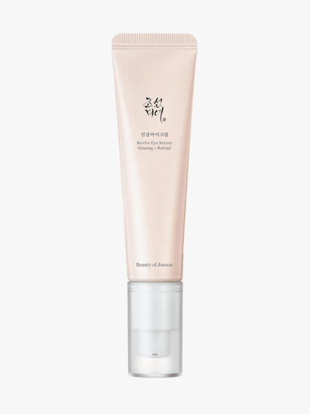 Beauty of Joseon Revive Eye Cream Ginseng + Retinal in branded light pink tube with white pump on light gray background